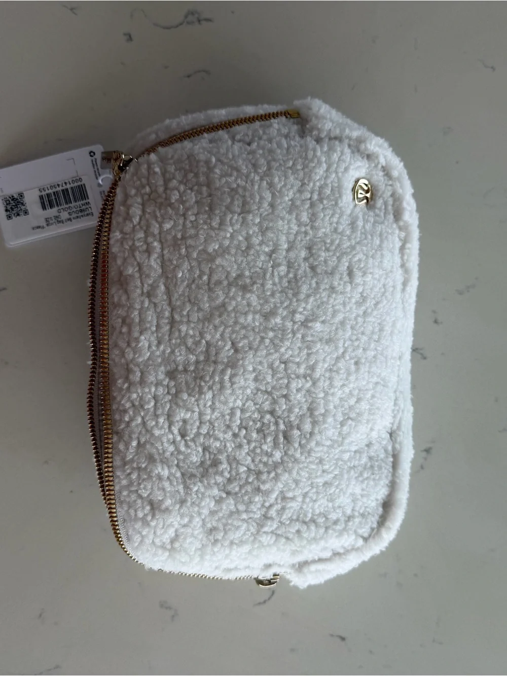 New lululemon athletica Cream Sherpa Pouch with Gold Accents